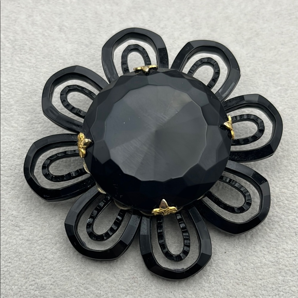Vintage black glass and plastic flower brooch 2.5 inches faceted glass center
